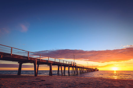 Henley Beach Jetty at sunset, South Australia. Color-tining appliedの写真素材