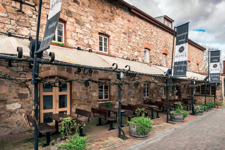Adelaide, Australia - August 13, 2016: Old Mill Hotel in the town of Hahndorf, Adelaide Hills area, South Australia. View from the main entrance.のeditorial素材