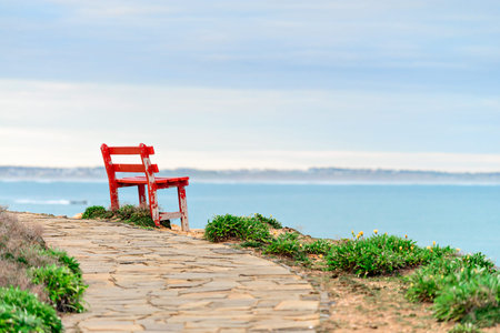 Bench with picturesque view at Port Elliot, Horseshoe Bay, South Australiaの写真素材