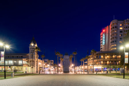 Adelaide, Australia - August 22, 2015: Moseley Square with Pioneer Memorial in the middle at night. Moseley Square is a public square in the City of Holdfast Bay. Long exposure camera settingsのeditorial素材