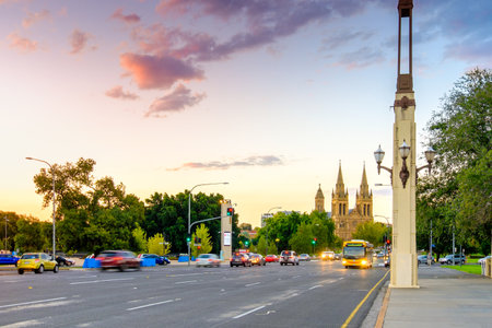 Adelaide, Australia - April 5, 2017: ASt. King William street and St. Peter's Cathedral viewed across King William bridgeのeditorial素材