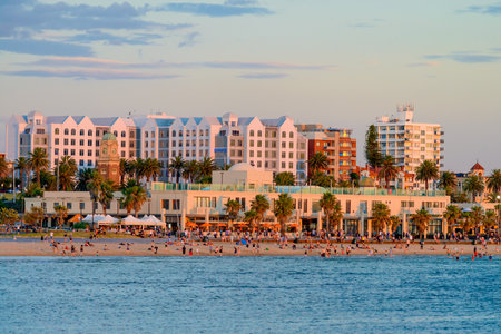 Melbourne, Australia - December 28, 2016: People spending time on St. Kilda Beach at sunset on a hot summer day, Victoria, Australiaのeditorial素材