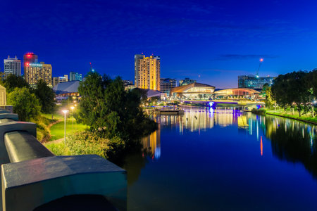 Adelaide, Australia - April 16, 2017: Adelaide city skyline at dusk viewed across Torrens river from King William bridgeのeditorial素材