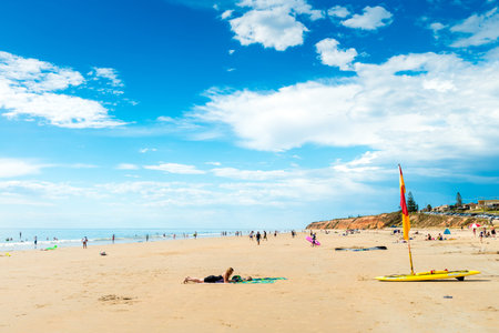 Adelaide, Australia - December 19, 2015: People relaxing and having fun at Moana Beach on a bright warm summer weekend. Moana is a great family beach for all agesのeditorial素材