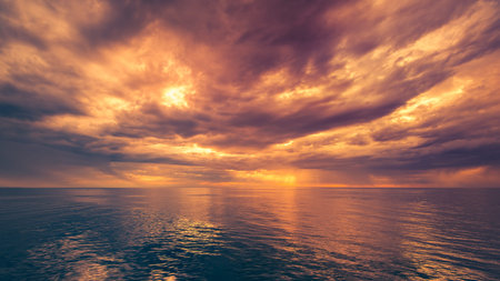 Dramatic ocean sunset with stormy clouds rain and sun rays