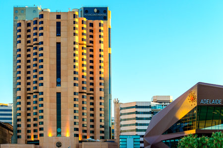 Adelaide, Australia - January 26, 2018: Hotel Intercontinental Adelaide building viewed from Elder Park at sunset towards south.のeditorial素材