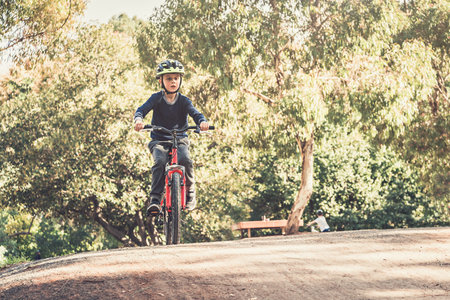 Australian boy riding his bicycles on special bike track in Adelaide, South Australia. Low point...