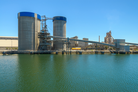 Port Adelaide industrial area viewed across river from shipの写真素材
