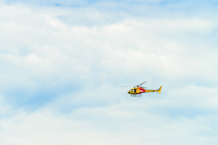 Adelaide, Australia - February 17, 2019: Westpac Lifesaver Rescue Helicopter patrolling South Australian beaches on a summer weekendのeditorial素材