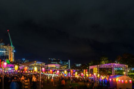 Adelaide, Australia - October 19, 2019: Elder Park fully packed with people during Moon Lantern Festival celebration at nightのeditorial素材