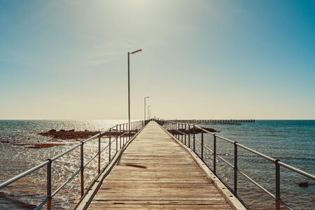 Moonta Bay foreshore with jetty on a bright day, Yorke Peninsula,  South Australiaの写真素材