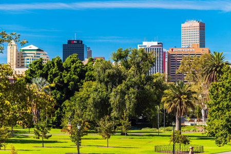Adelaide, Australia - February 23, 2020: Adelaide city skyline viewed through Pennington Gardens on a dayのeditorial素材
