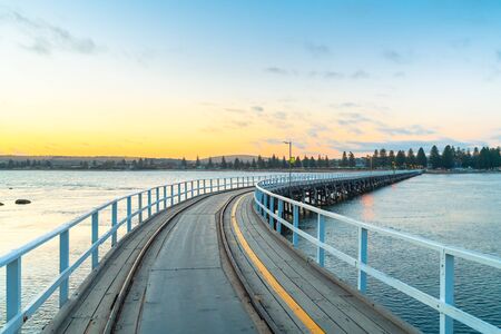Victor Harbor Causeway at sunset viewed from Granite Island, Encounter Bay, South Australiaの写真素材