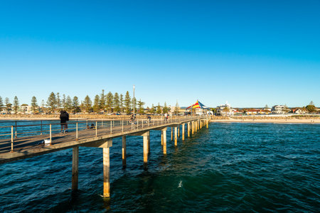 Adelaide, South Australia - December 22, 2018: Fishermen fishing from Brighton Beach Jetty at sunset during summer seasonのeditorial素材