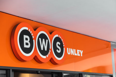 Adelaide, South Australia - August 17, 2019: BWS bottle shop logo sign at Unley shopping center on a dayのeditorial素材