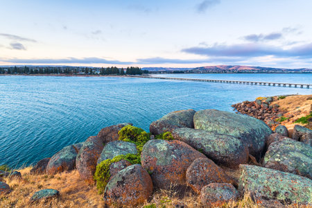 Granite Island rugged coastline at dusk, Victor Harbor, South Australia