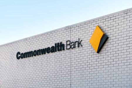 Adelaide, South Australia - August 17, 2019: Commonwealth Bank branch logo sign above the entrance...