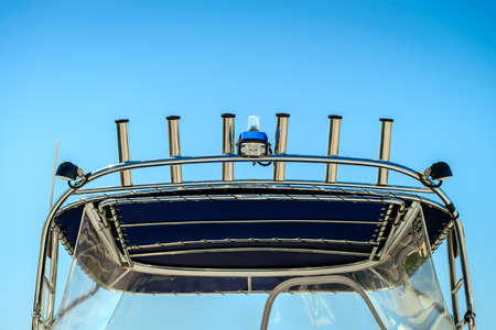 Fishing rod holders installed on top of the boat canopyの写真素材