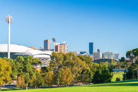 Adelaide, South Australia - April 4, 2021: Adelaide city skyline viewed from the Montefiore Hill across the Adelaide Oval on a bright dayのeditorial素材