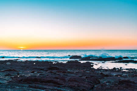 Hallett Cove rocky shore at sunset in South Australiaの写真素材
