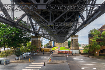Sydney, Australia - April 16, 2022: Pedestrian walkway under Sydney Harbour bridge viewed from Cumberland Street on a day.のeditorial素材