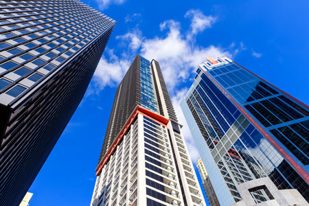 New skyscrapers in Sydney city while looking up from Bathurst Street on a dayのeditorial素材
