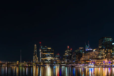 Sydney, Australia - April 16, 2022: Darling Harbour viewed towards King Street Wharf and Crown Sydney hotel at night timeのeditorial素材
