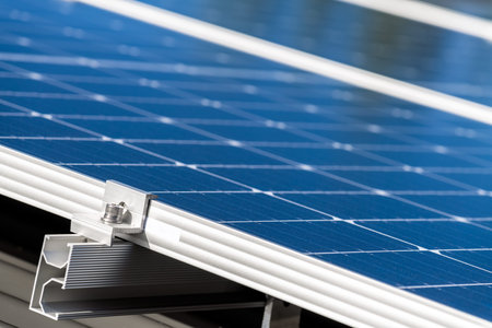 Close-up view of solar panel with focus on rail bracket installed on a house roof in Australia.