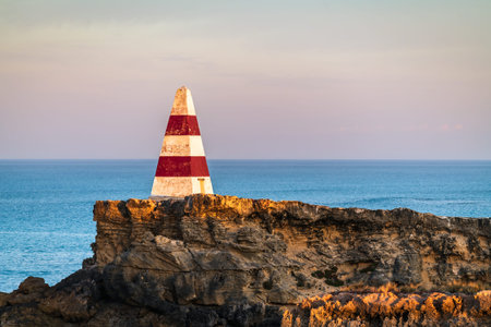 <p>The iconic Robe Obelisk at sunrise viewed towards the ocean. A timeless monument that stands the...