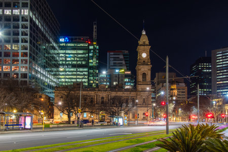 Adelaide, Australia - September 10, 2019: Adelaide city skyline with office buildings viewed from Victoria Square  while illuminated at night time.のeditorial素材