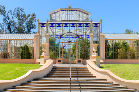 Adelaide, South Australia - December 22, 2023: 1877 tropical palm house main entrance with stairs in Adelaide Botanic Garden viewed on a dayのeditorial素材