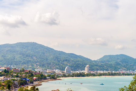 Patong Beach coastline viewed from Kalim Bay in the morning, Phuket, Thailandの写真素材