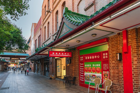 Adelaide, South Australia - December 19, 2020: Cafes, restaurants and boutiques with people in Adelaide City Chinatown centre viwed towards Gouger Street entrance on an afternoonのeditorial素材