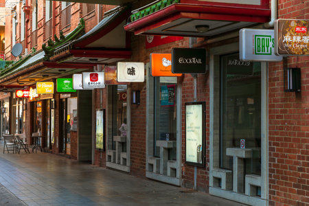 Adelaide, South Australia - December 19, 2020: Cafes, restaurants and boutiques in Adelaide Chinatown centre viwed towards Gouger Street entrance during an evening timeのeditorial素材