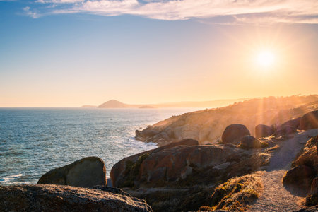 Encounter Bay coastline viewed from Granite Island at sunset, South Australiaの写真素材