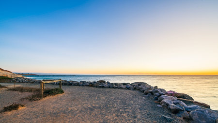 Christies Beach coastline with Witton Bluff trail at dusk while viewed towards Port Noarlungaの写真素材