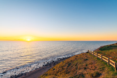 Hallett Cove Conservation Park Coastal Walkway along the coast with sea views at sunset, South Australiaの写真素材