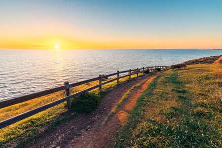 Hallett Cove Conservation Park Coastal trail with ocean views at sunset, South Australiaの写真素材