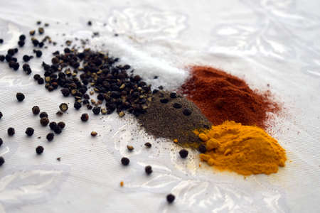 Spices, pepper, salt, sweet pepper, turmeric.の写真素材