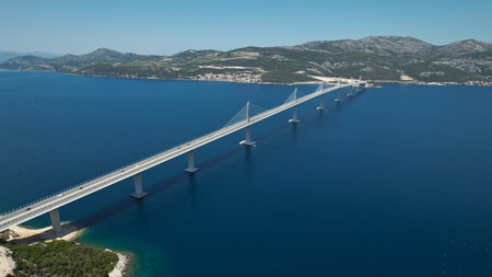 Magnificent Aerial View of PeljeÅ¡ac Bridge Spanning Adriatic Sea Watersの写真素材