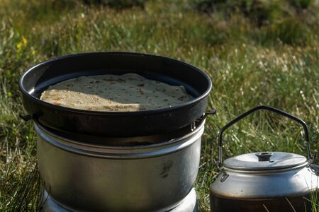 Cooking pancake outdoorsの写真素材