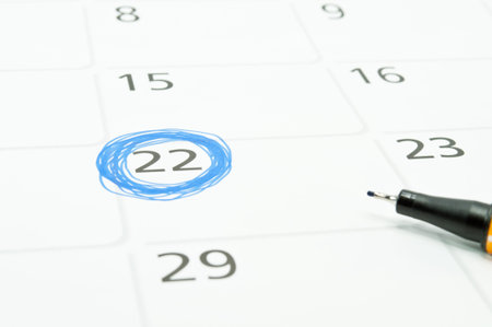 The Blue circle in the frame. Mark on the calendar at 22.