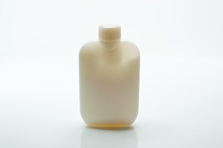 Bottle of cream  on a white background の写真素材