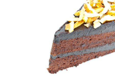Chocolate cake and sprinkle with the almonds on a white background
