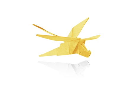 Paper dragonfly in flight isolated on a white background, Origami.の写真素材