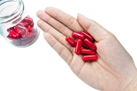 Close up red medicine for medical on white background