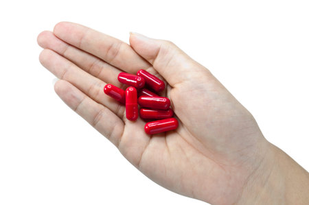 Close up red medicine for medical on white background