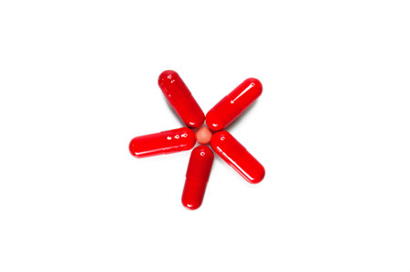 Close up red medicine for medical on white background