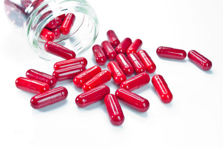 Close up red medicine for medical on white backgroundの写真素材