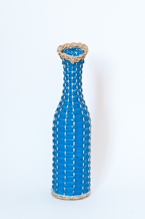 Blue woven flower vase vintage and classic style on white background.の写真素材